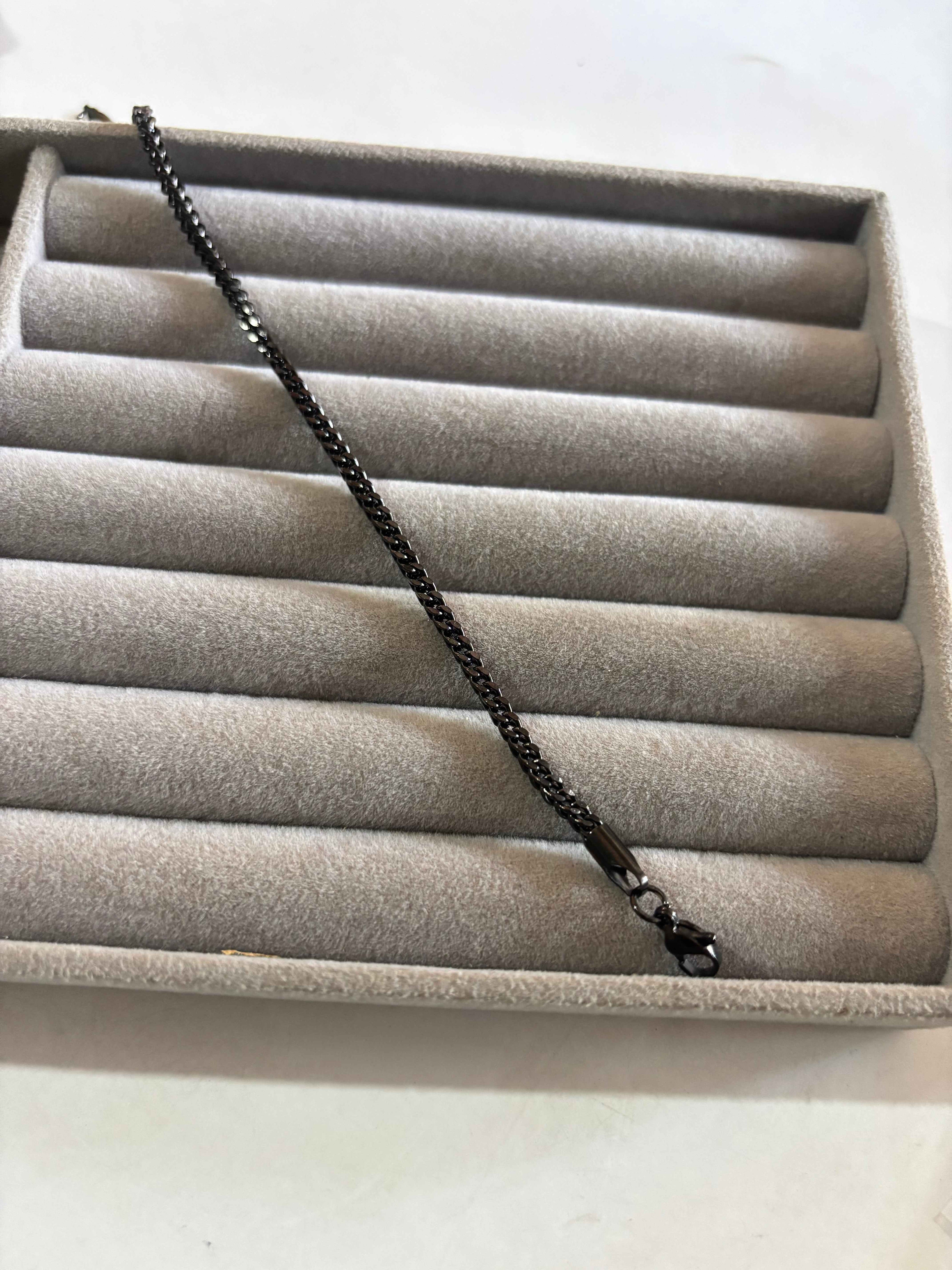 Black curb link bracelet