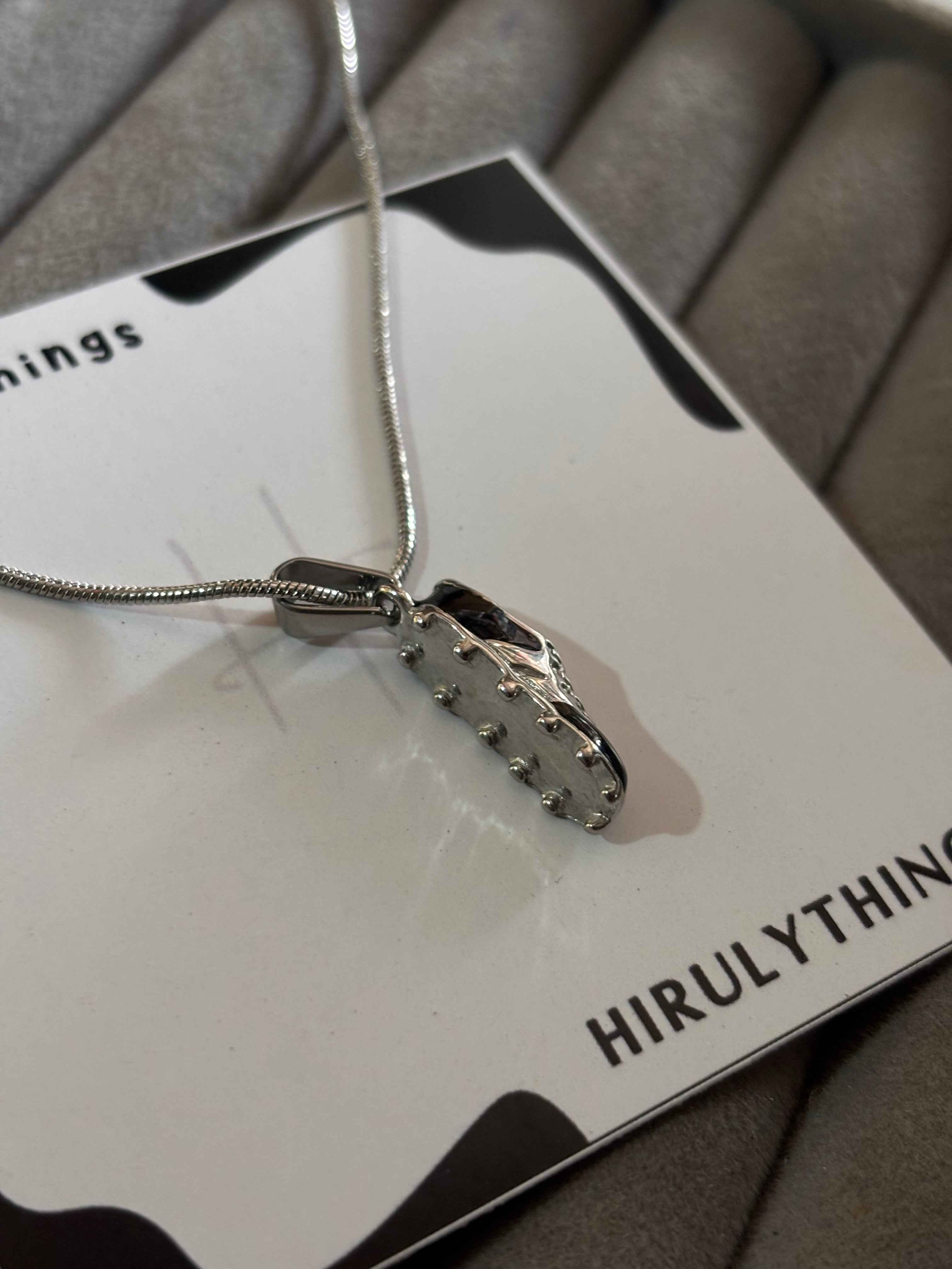 Soccer shoe necklace