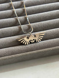 Winged skull necklace