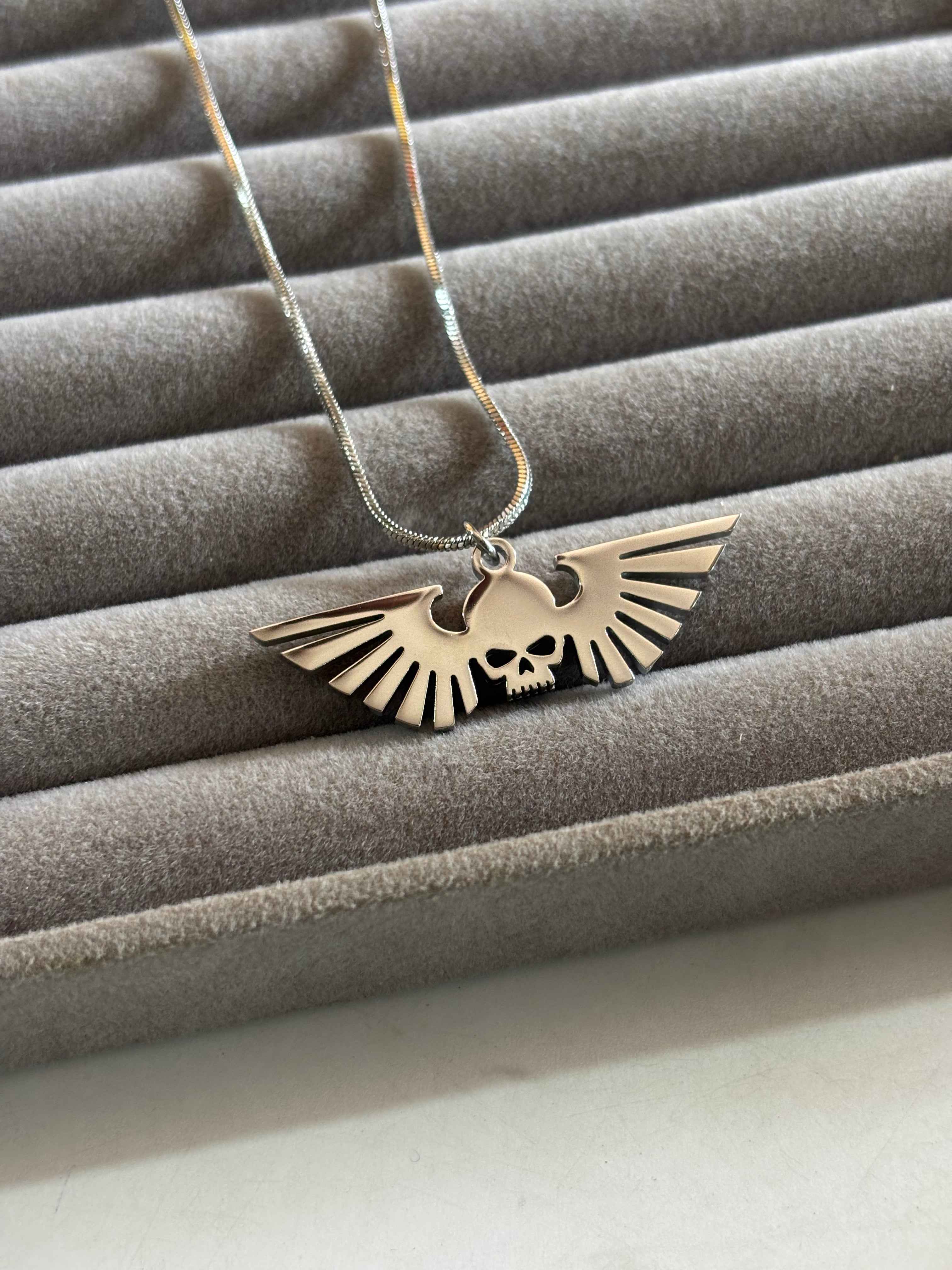 Winged skull necklace