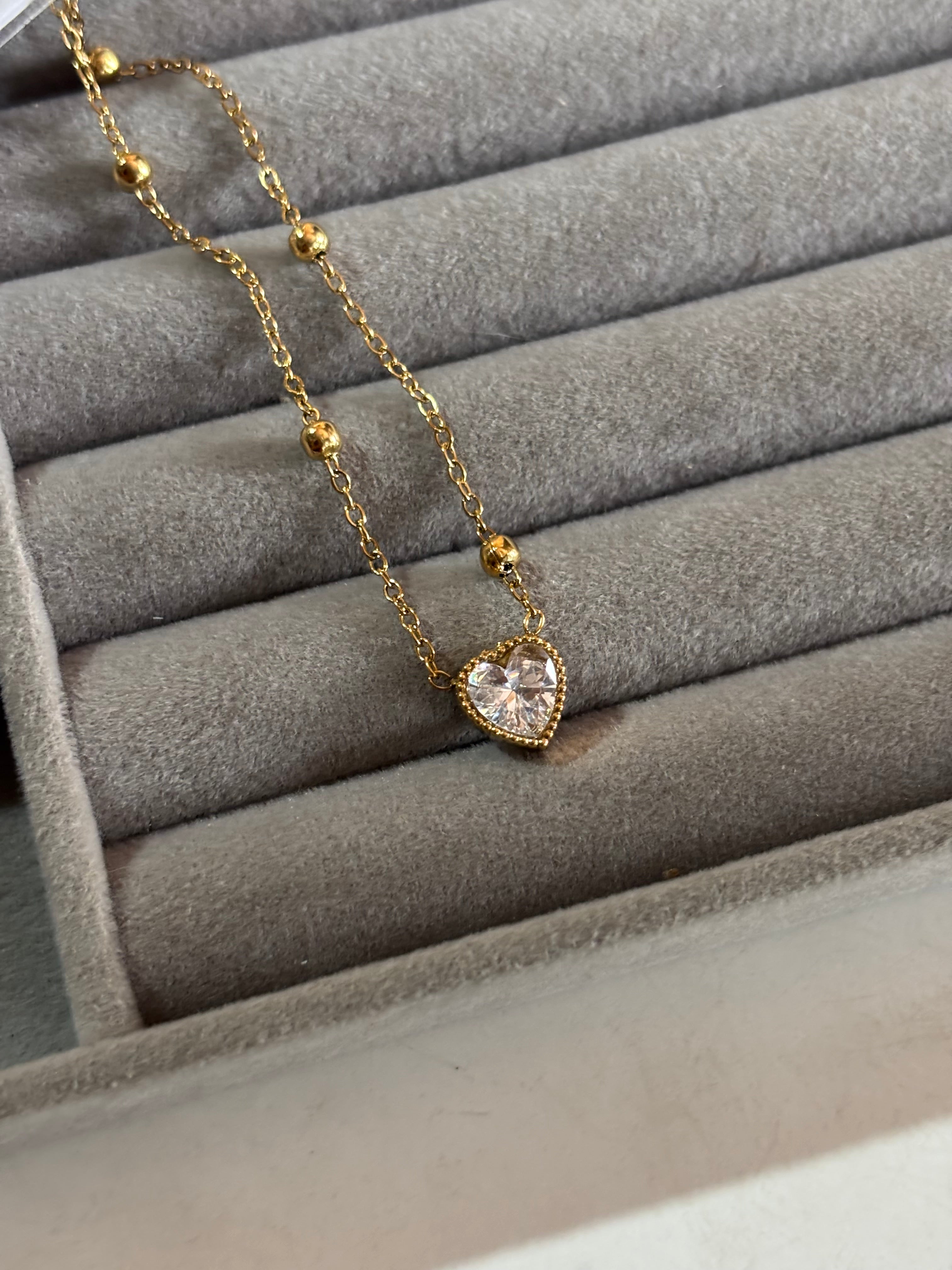 Minimal solitaire heart necklace