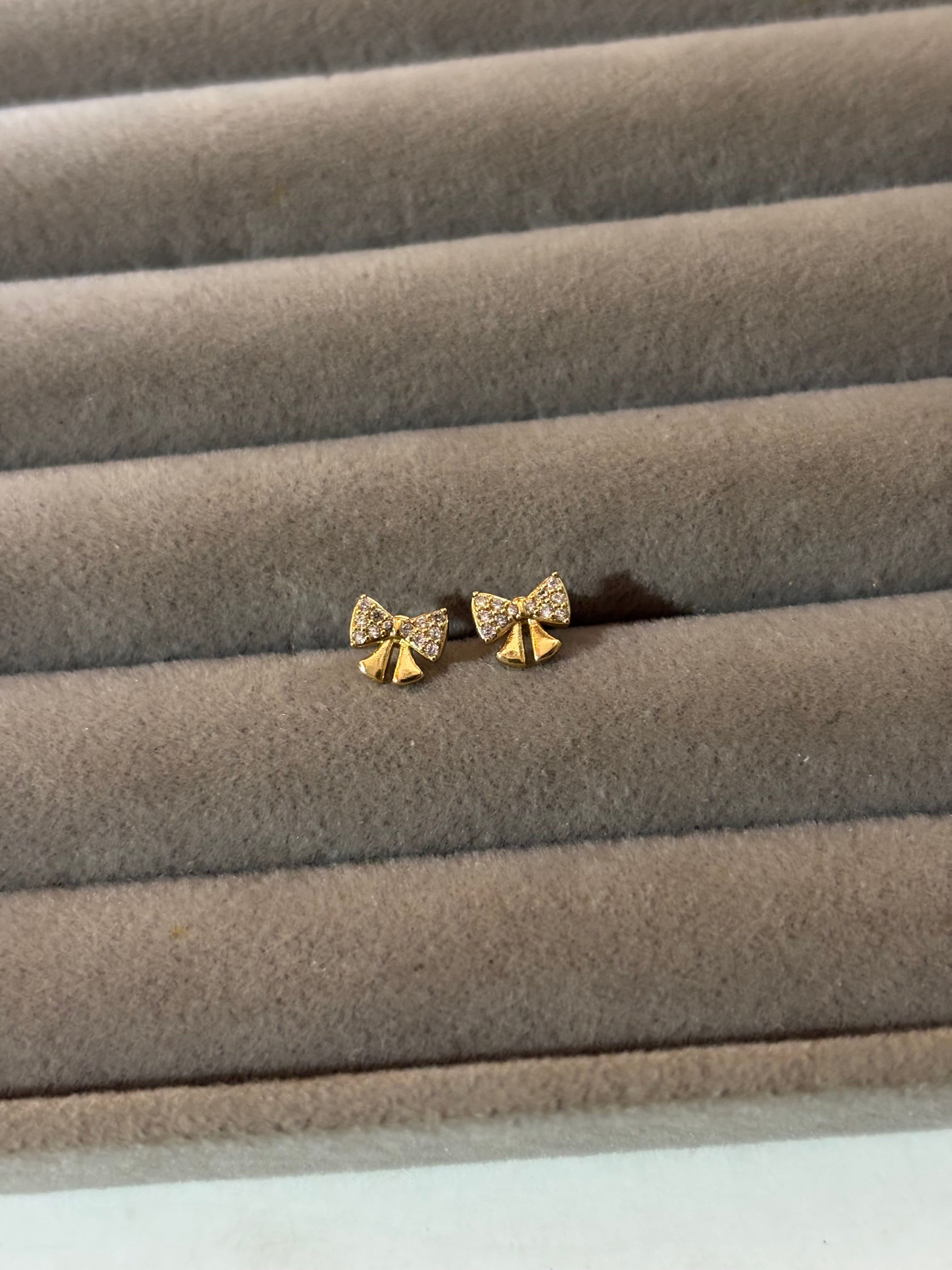 Studded bow piercing