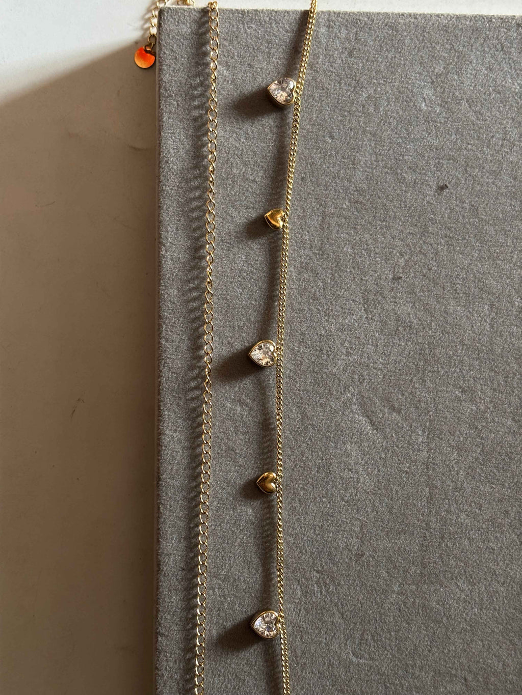 Solitaire hearts hip chain
