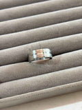 Monochrome silver band ring