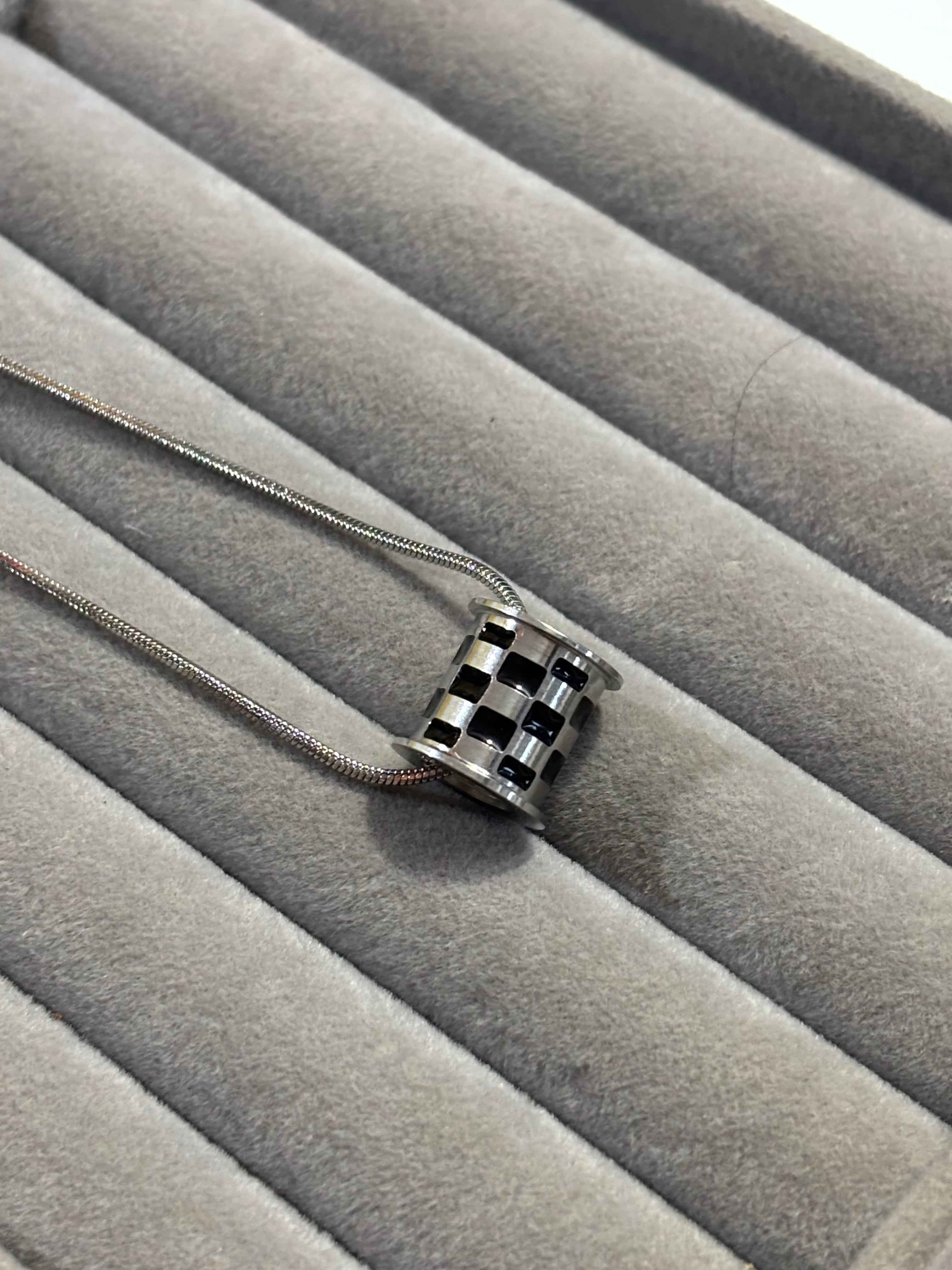 checkered drum necklace