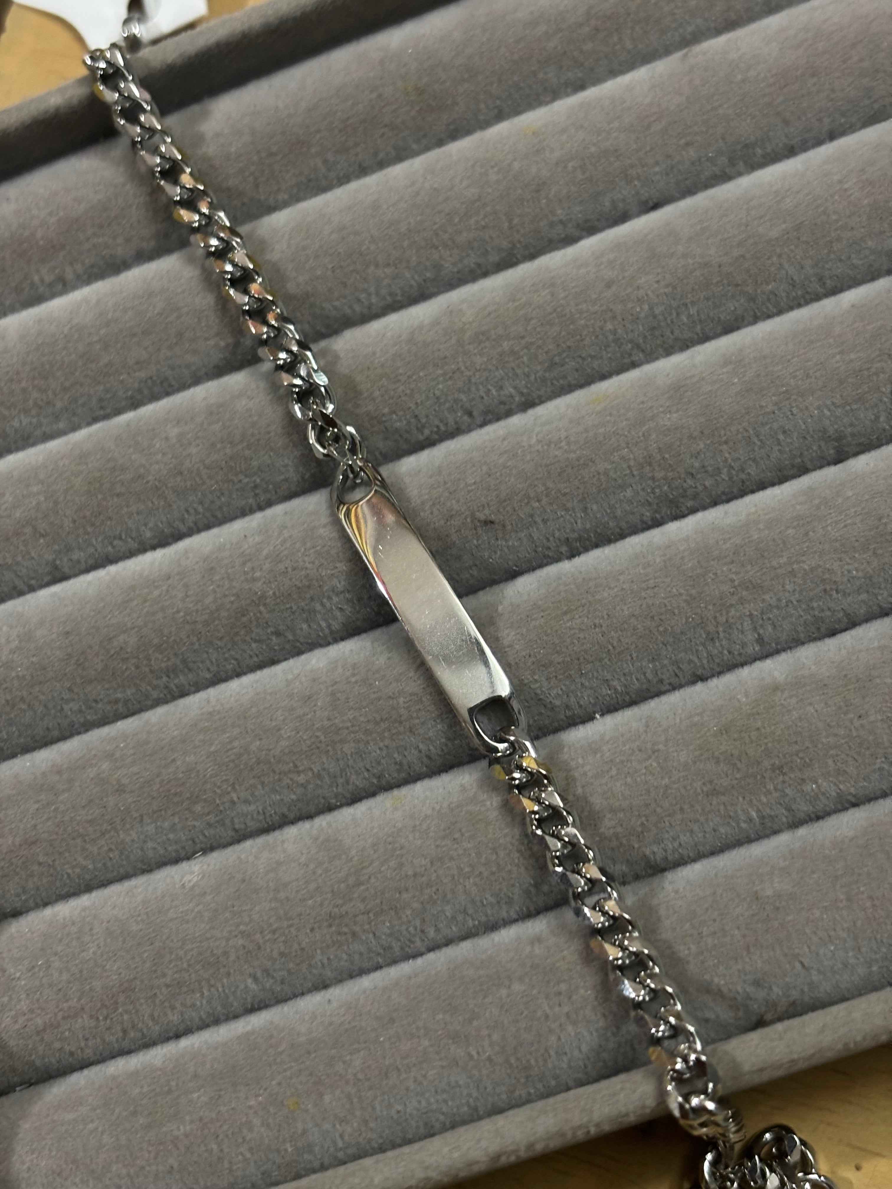 Steel tag bracelet