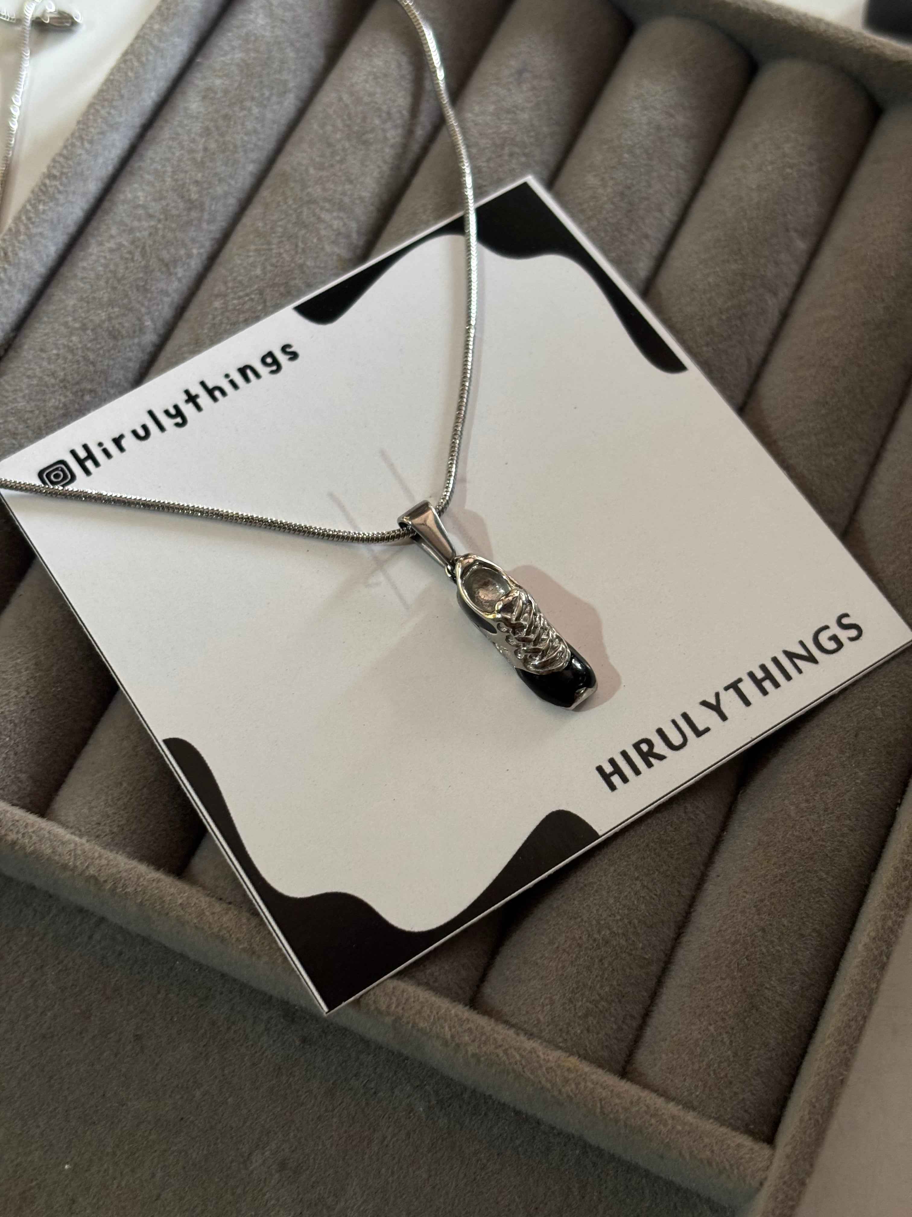Soccer shoe necklace